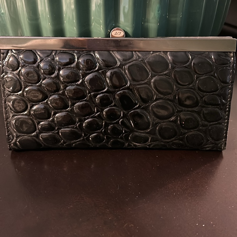 Woman’s black clutch or wallet. NWOT